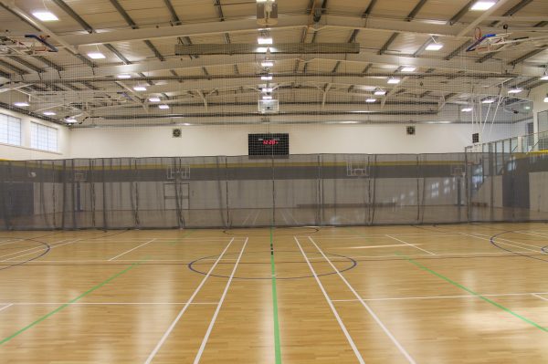 Operating divider solution for my sports hall Uk